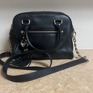 Black medium sized Michael Kors purse